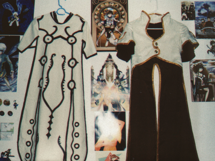 photo of Luke and Sorey cape cosplays displayed on wall
